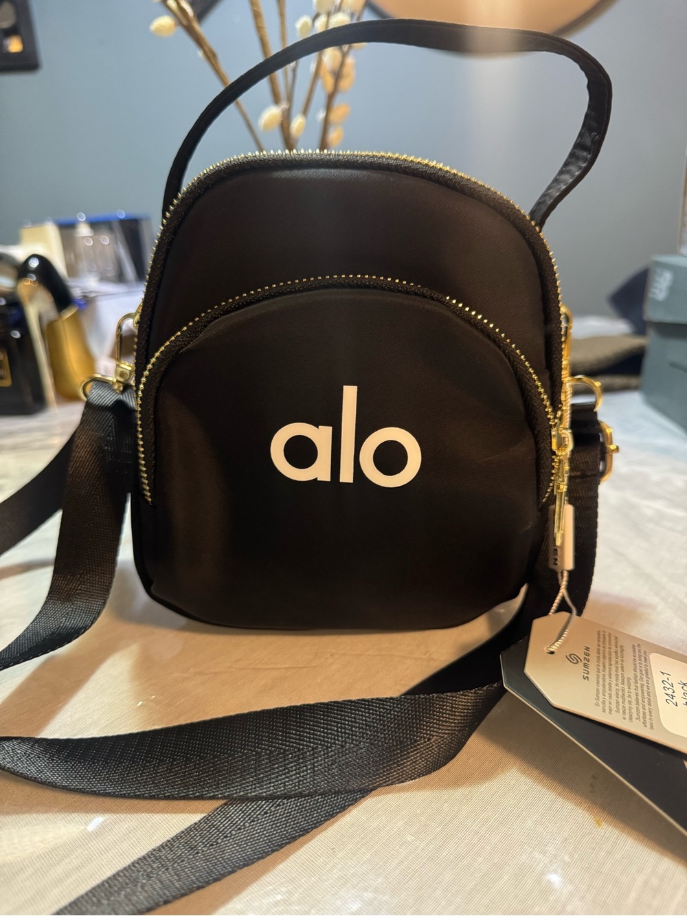Black Mini Crossbody Bag with Gold Hardware